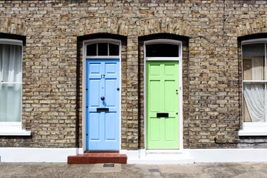 uk-housing-two-doors-blue-and-green-background